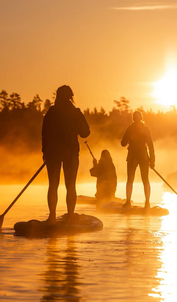 Photo of people paddling on river