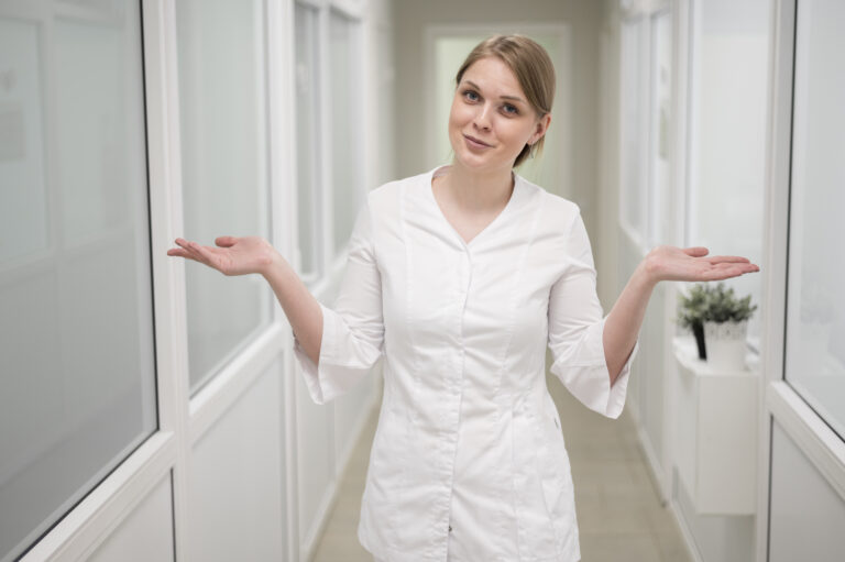 front-view-doctor-posing-indoors
